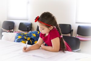 young girl studying