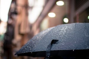 Close up of black umbrella with raindrops